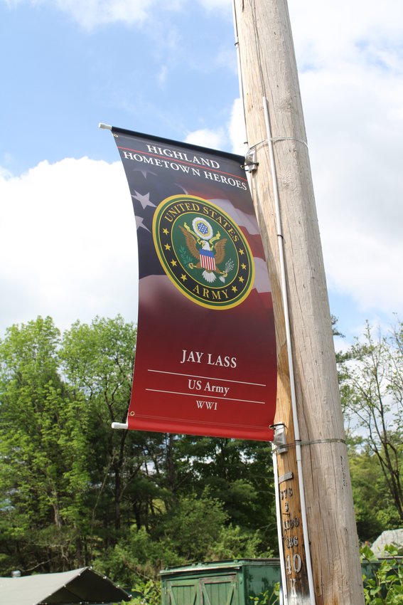 A banner honoring the project's sole WWI veteran, Jay Lass